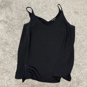 Black tank top. Sheer material but has a liner in the front